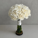 Ivory carnation wedding bouquet in a round dome — wedding bouquets Warsaw