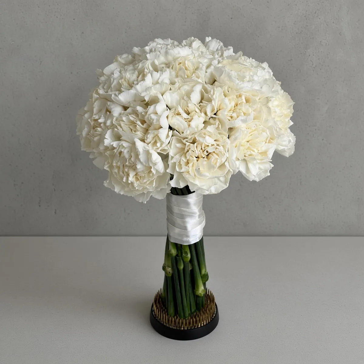 Ivory carnation wedding bouquet in a round dome — wedding bouquets Warsaw