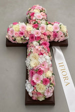 Rose Memory funeral flower cross of pink and cream roses, gerberas and hydrangea on a wooden base — funeral flowers IFIORA Warsaw